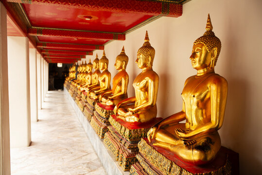 A row of Buddhist statues.