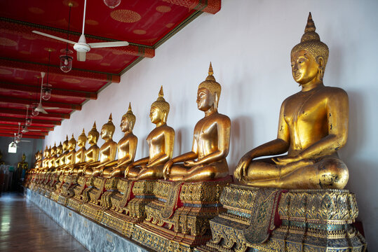 A row of Buddhist statues.