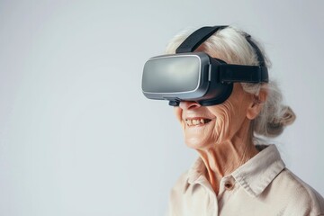 Grandmother, elderly gray-haired woman wearing virtual reality glasses. Fashionable pensioners master modern technologies, play video games, watch a magical 3D world