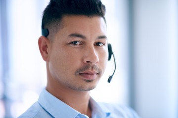 Businessman, call center and headphones in portrait for customer service, support or telemarketing...