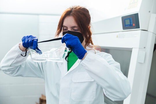 Female scientist researcherworking on biotech laboratory