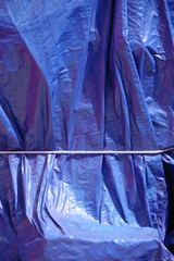 Blue tarp cover wrapped around big items - obrazy, fototapety, plakaty