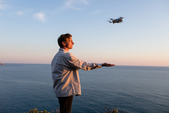 Man and quadcopter