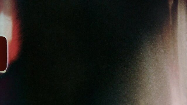 Scratched Damaged Footage Transition. Animation of a blank loopable old vintage damaged 8mm film tape