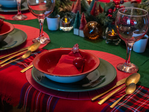 Festive Holiday table setting for a Christmas dinner party