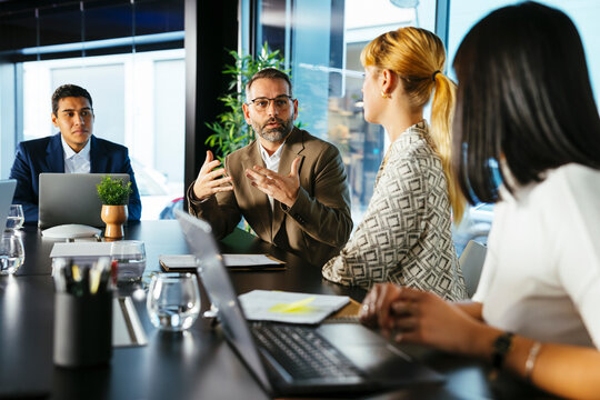 Business advisors discussing strategy in office