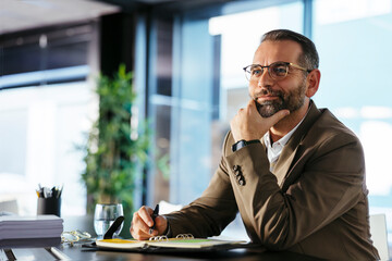 Financial advisor working at modern space