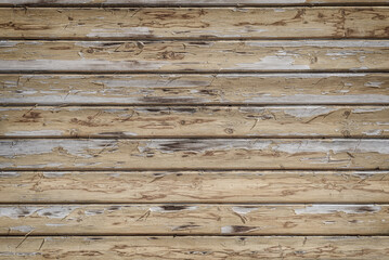 Old wooden wall of peeling boards, background.