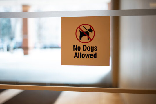 A sign in the lobby of a building.