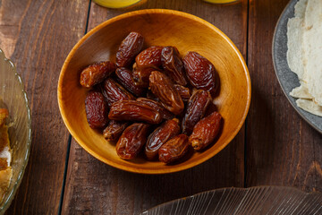 Dates in a plate on the festive table of Ramadan Iftar