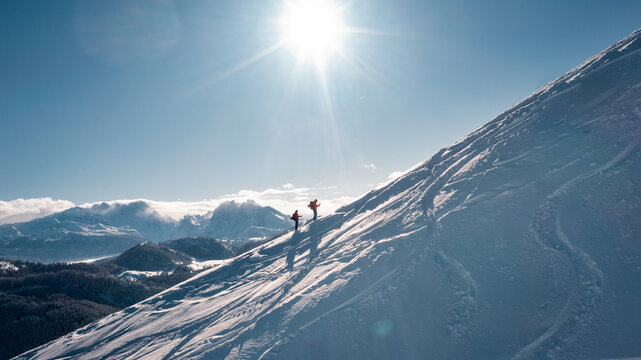 ski tourer on steep slope with panorama view