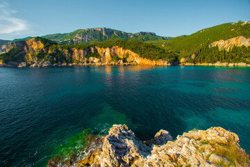 fantastic morning view on pebble beach Rovinia near Paleokastritsa, , Corfu island, Europe	