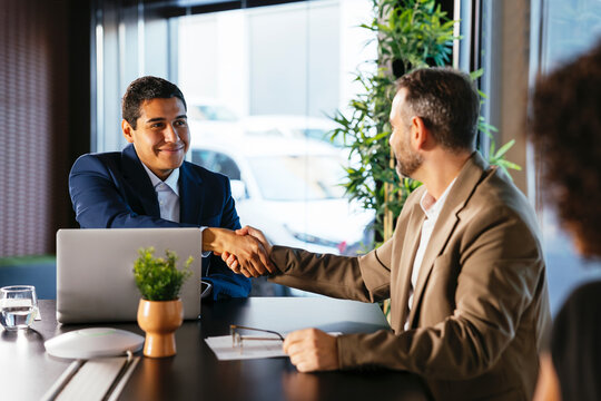 Lawyers handshake after good deal agreement