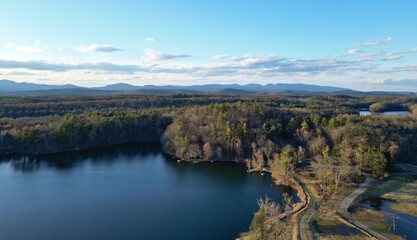 catskill mountains and lake near rosendale (aerial drone view of sunset in distant hills) scenic...