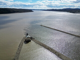 rondout lighthouse in kingston new york (aerial photo of small light house at confluence of hudson...