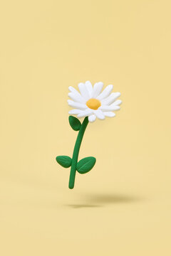 Flower with white petals made of clay