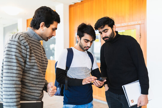 College students standing in corridor