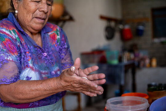Senior Mexican woman in the kitchen