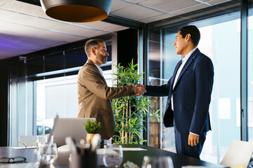 Lawyers handshake after good deal agreement