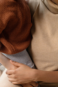 Cozy Comfort: Mom Holding Baby Close