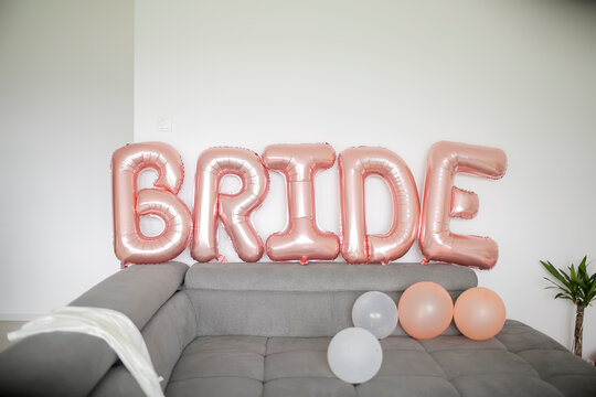 "bride" word lettering with balloons