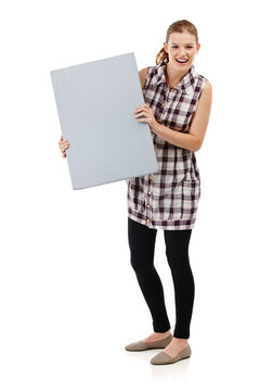 Portrait, happy woman and board in studio with smile, mock up and advertising. Happiness, marketing and face of isolated female person by white background for sign with sale, branding and info poster