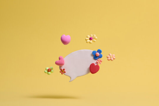 Blank speech bubble with floral plasticien art with heart shape