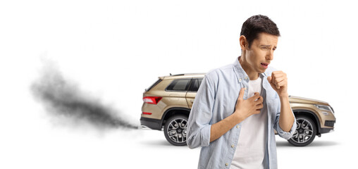 Man coughing from smoke coming out of a vehicle exhaust pipe - obrazy, fototapety, plakaty
