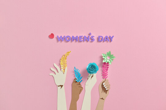 Different skin-colored elegant women hands