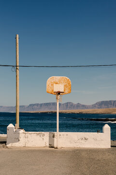 Basketball hoop in coastal village