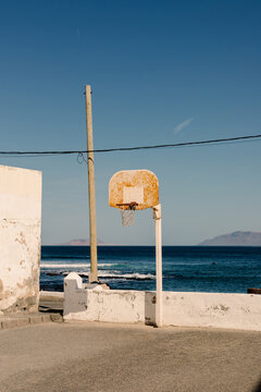 Basketball hoop in coastal village