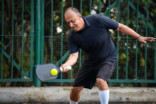 Man playing pickleball