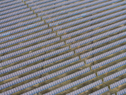 Solar farm drone shot - telephoto images of solar panels