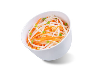 Daikon radish carrot noodles salad on a white isolated background