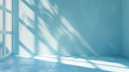 Minimal abstract light blue background for product presentation. Shadow and light from windows on plaster wall.