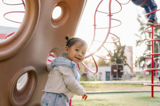 Little girl playing in the park.