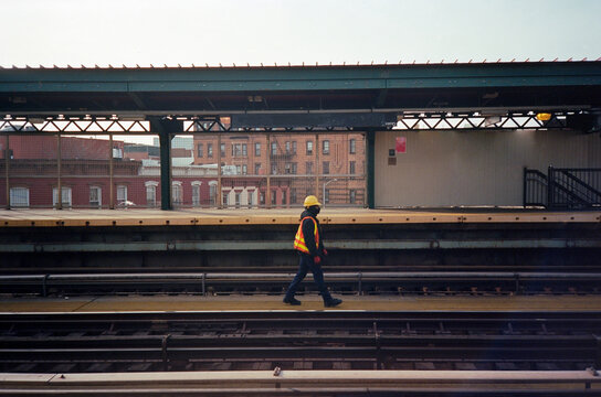 Worker on train tracks