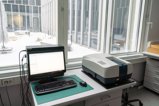 Desk With Spectrophotometer In The Lab