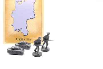 Plastic gray army toys with Ukraine map. War concept. - obrazy, fototapety, plakaty