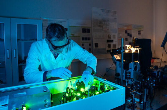 Male Researcher Working WithLaser Technologies