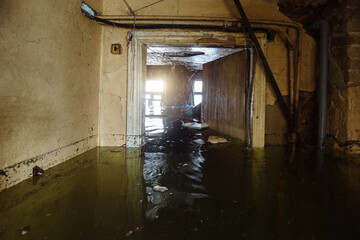 Flooded old house interior. Natural disaster concept