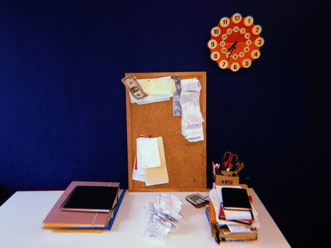 Business receipts on a desk with notebooks 