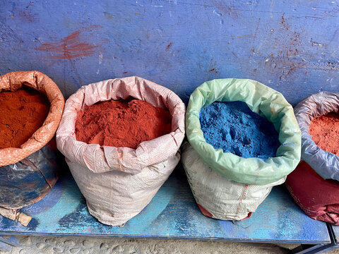 Colorful pigments for sale at market, Morocco