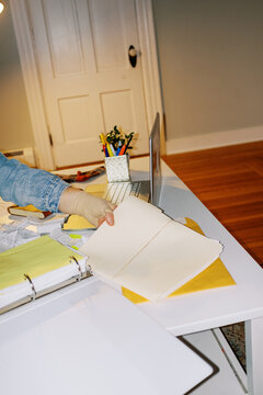 ugc lo-fi of hands working with receipts and paperwork at home