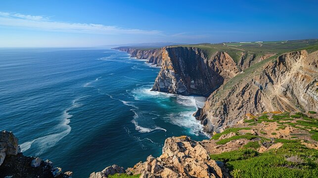Coastal hike along rugged cliffs, offering panoramic views of the endless expanse of ocean