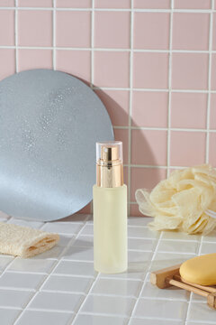 Body care cosmetics with accessories on basin cabinets in bathroom