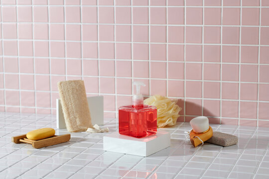 Red gel bottle mockup for bathing products in bathroom