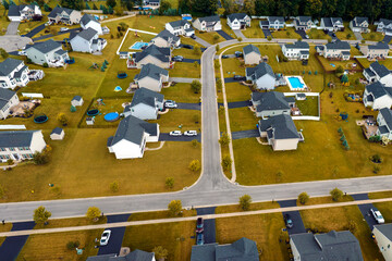 Aerial view of spacious new family houses in upstate New York suburban area. Real estate...