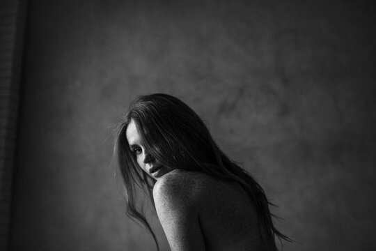 Woman's portrait of Ginger female with many freckles