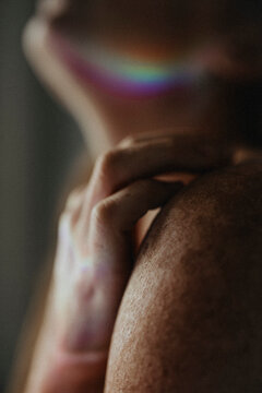 Close Up photo of Ginger female with many freckles on the hand